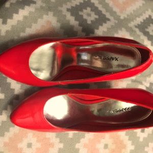 Red X appeal women’s pumps